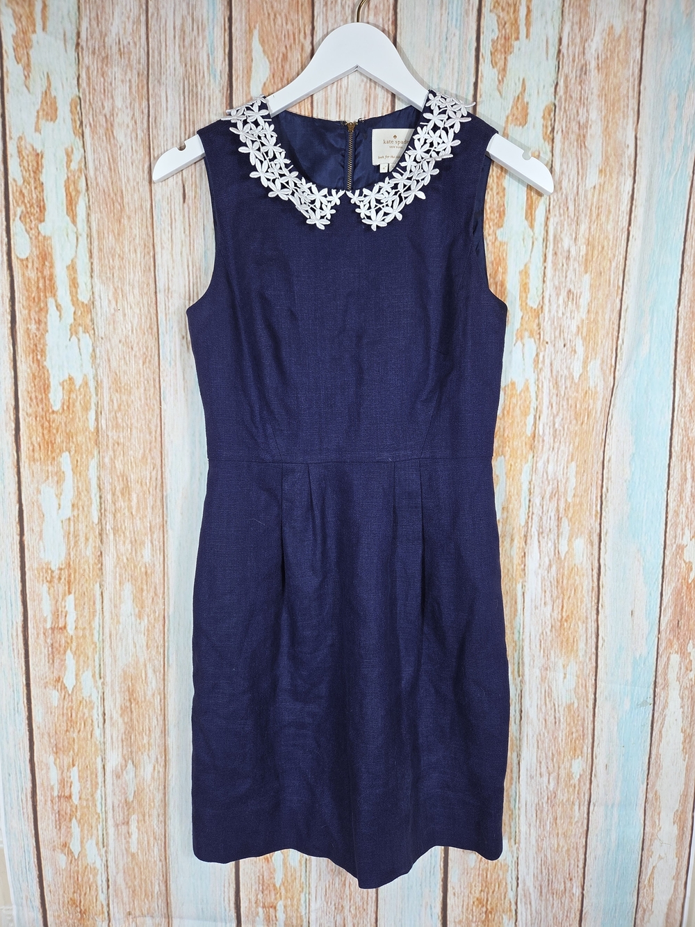 kate spade navy sleeveless sheath dress with white floral collar. Size 4